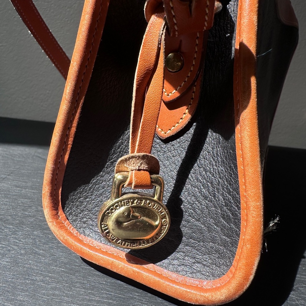 Dooney and Bourke vintage zippered opening purse